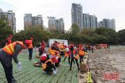 闽江公园举办植树节活动 200多人“插秧”打造绿色生态江岸